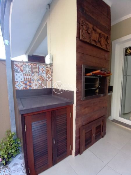 Casa à venda com 3 quartos, 90m², 1 suíte, 1 vaga, Rua Eva Pinto no bairro Hípica em Porto Alegre