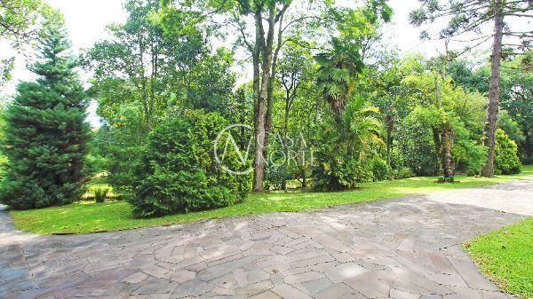 Casa de Condomínio à venda com 3 quartos, 348m², 3 suítes, 3 vagas, Avenida Professor Oscar Pereira no bairro Cascata em Porto Alegre