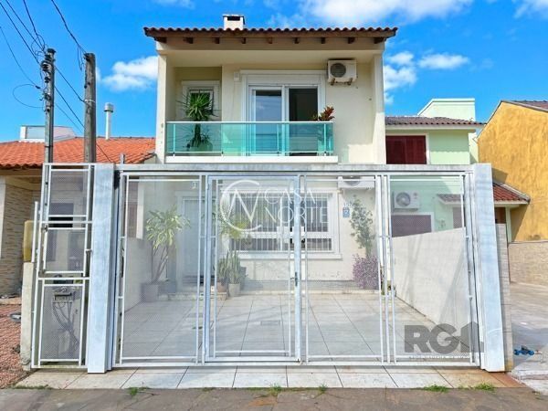 Casa à venda com 3 quartos, 108m², 1 suíte, 2 vagas, Rua Samuel Wainstein no bairro Aberta dos Morros em Porto Alegre