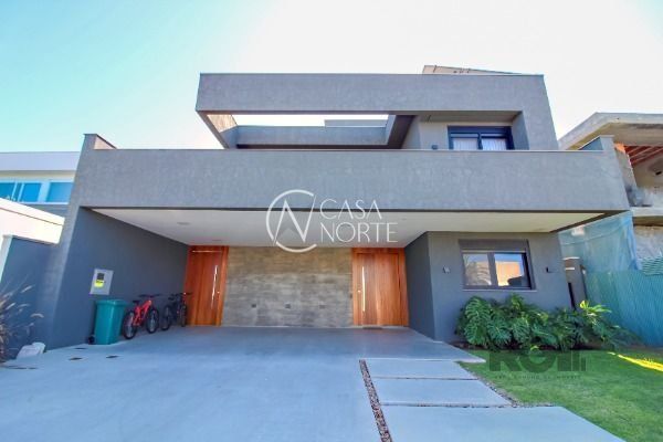 Casa de Condomínio à venda com 4 quartos, 450m², 4 suítes, 2 vagas, Avenida Juca Batista no bairro Belém Novo em Porto Alegre