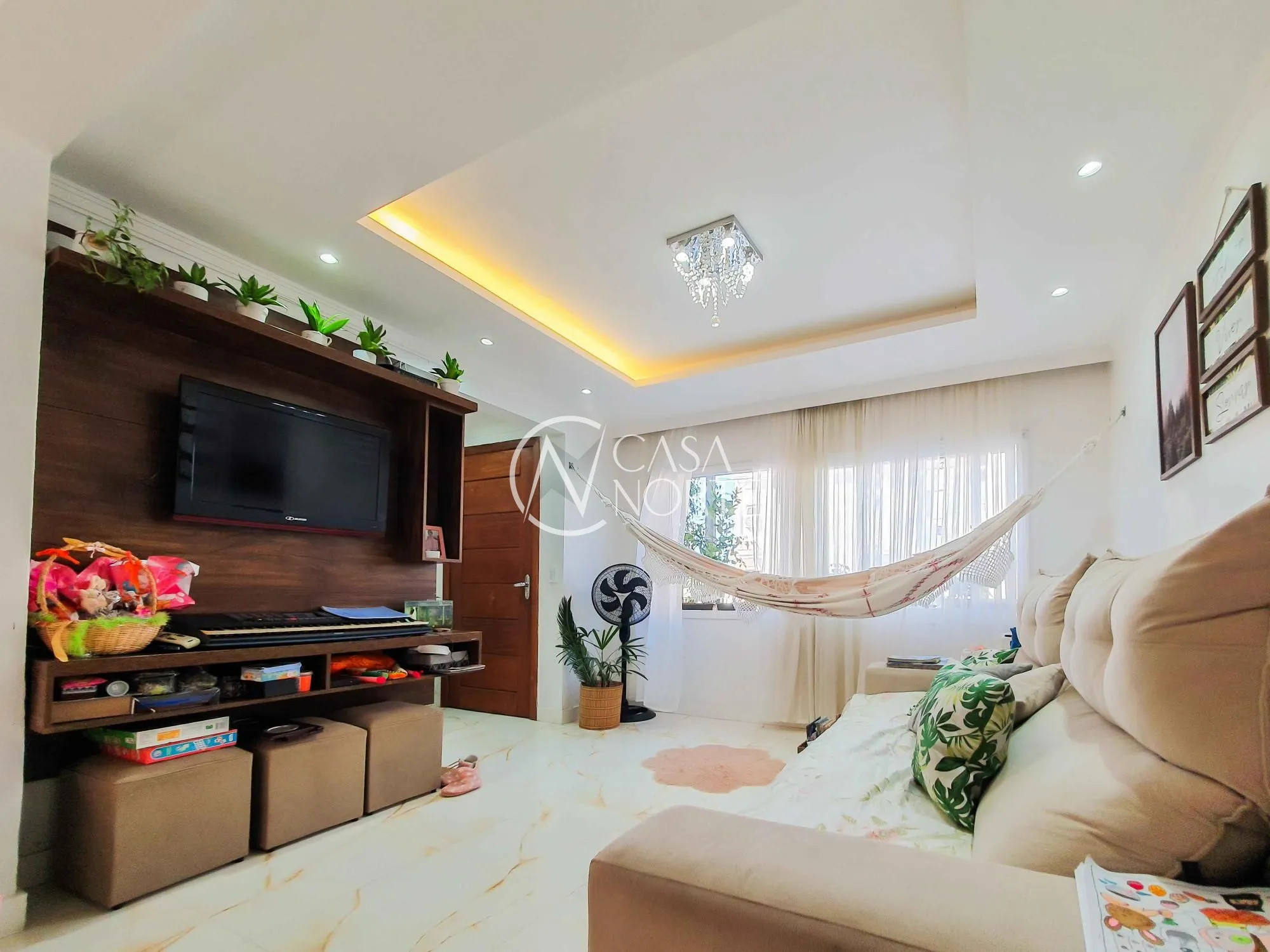 Casa de Condomínio à venda com 3 quartos, 141m², 1 suíte, 2 vagas, Avenida Edgar Pires de Castro no bairro Hípica em Porto Alegre
