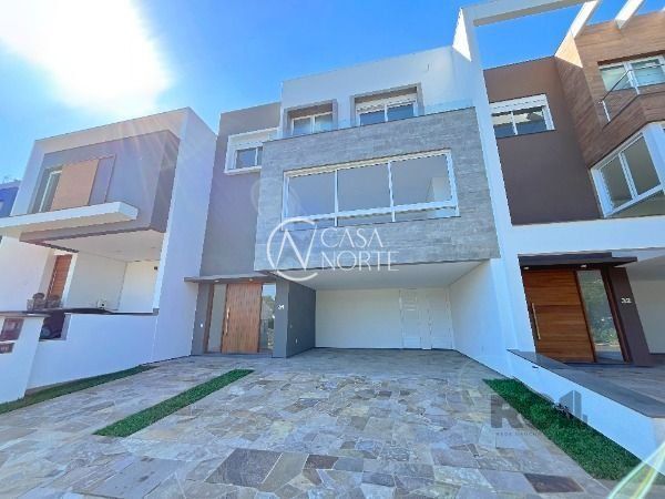 Casa de Condomínio à venda com 3 quartos, 254m², 3 suítes, 2 vagas, Rua Ivo Walter Kern no bairro Hípica em Porto Alegre
