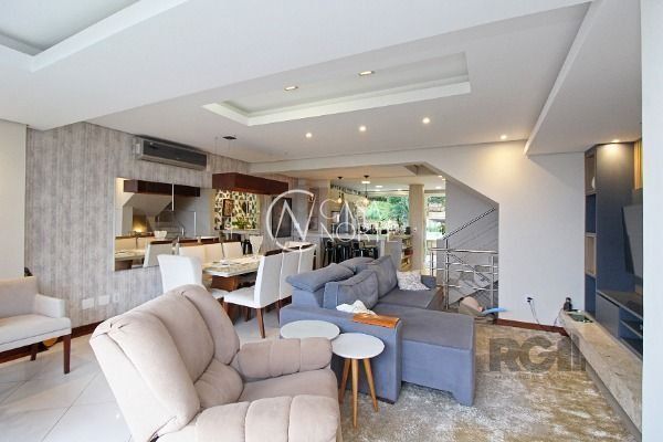 Casa de Condomínio à venda com 4 quartos, 219m², 1 suíte, 2 vagas, Rua Professor Xavier Simoes no bairro Sétimo Céu em Porto Alegre