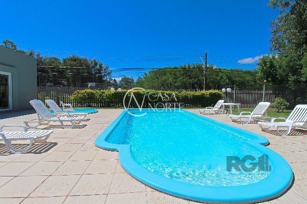 Casa de Condomínio à venda com 3 quartos, 168m², 1 suíte, 2 vagas, Rua Eroni Soares Machado no bairro Hípica em Porto Alegre