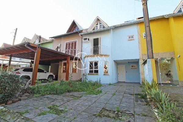 Casa de Condomínio à venda com 3 quartos, 161m², 1 suíte, 2 vagas, Rua Osorio Mendes Ouriques no bairro Guarujá em Porto Alegre