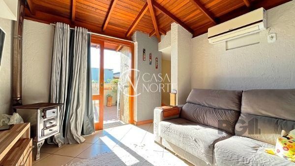 Casa de Condomínio à venda com 2 quartos, 102m², 1 suíte, 1 vaga, Avenida Guarujá no bairro Guarujá em Porto Alegre