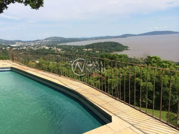 Casa à venda com 6 quartos, 596m², 4 suítes, 6 vagas, Rua Professor Antônio Davila no bairro Sétimo Céu em Porto Alegre