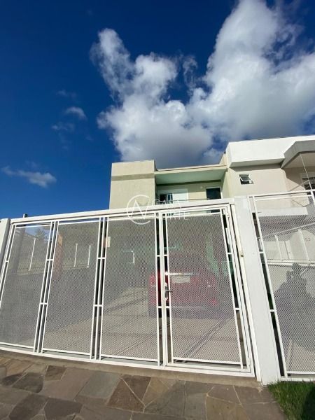 Casa à venda com 3 quartos, 137m², 1 suíte, 2 vagas, Rua Jean Vardaramatos no bairro Hípica em Porto Alegre