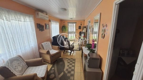 Casa à venda com 4 quartos, 220m², 3 vagas, Rua Capitao Pedroso no bairro Restinga em Porto Alegre