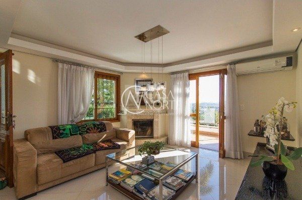 Casa à venda com 3 quartos, 154m², 1 suíte, 3 vagas, Rua Professor Othon Santos Silva no bairro Aberta dos Morros em Porto Alegre