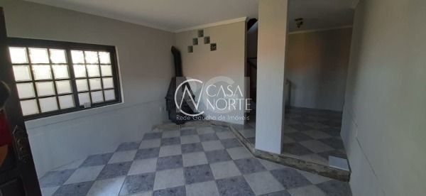 Sobrado à venda com 3 quartos, 246m², 1 suíte, 2 vagas, Rua Angelo Passuelo no bairro Vila Nova em Porto Alegre