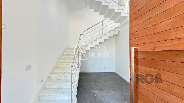 Casa de Condomínio à venda com 3 quartos, 256m², 3 suítes, 2 vagas, Rua Ivo Walter Kern no bairro Hípica em Porto Alegre