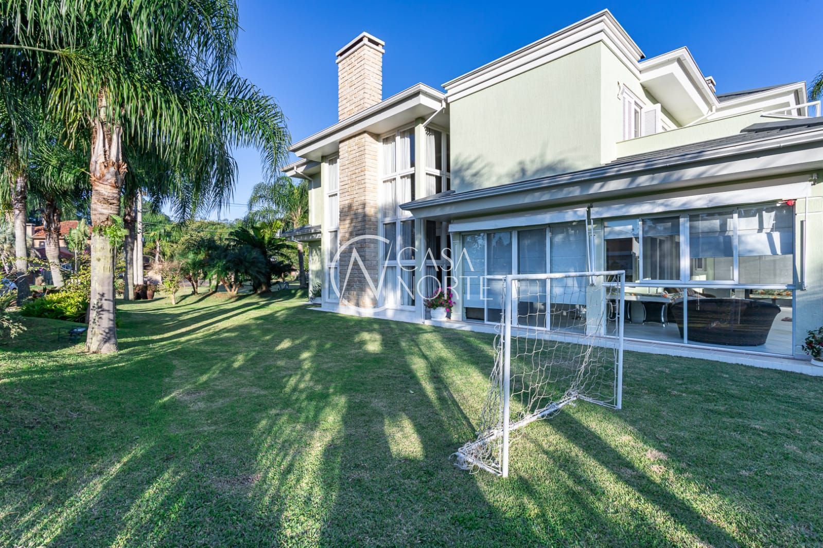 Casa de Condomínio à venda com 4 quartos, 412m², 4 suítes, 3 vagas, Avenida Juca Batista no bairro Chapéu do Sol em Porto Alegre