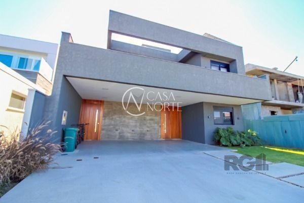 Casa de Condomínio à venda com 4 quartos, 450m², 4 suítes, 2 vagas, Avenida Juca Batista no bairro Belém Novo em Porto Alegre