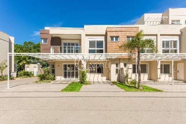 Casa de Condomínio à venda com 3 quartos, 155m², 1 suíte, 2 vagas, Estrada João Salomoni no bairro Vila Nova em Porto Alegre