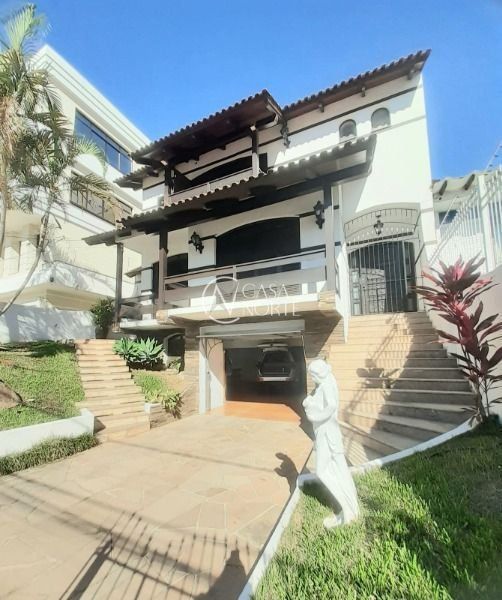 Casa Comercial à venda com 4 quartos, 384m², 3 vagas, Rua Afonso Álvares no bairro Tristeza em Porto Alegre