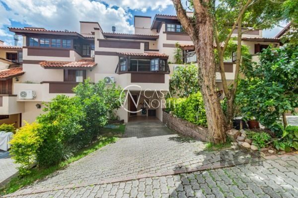 Casa de Condomínio à venda com 3 quartos, 175m², 1 suíte, 2 vagas, Avenida Wenceslau Escobar no bairro Vila Conceição em Porto Alegre