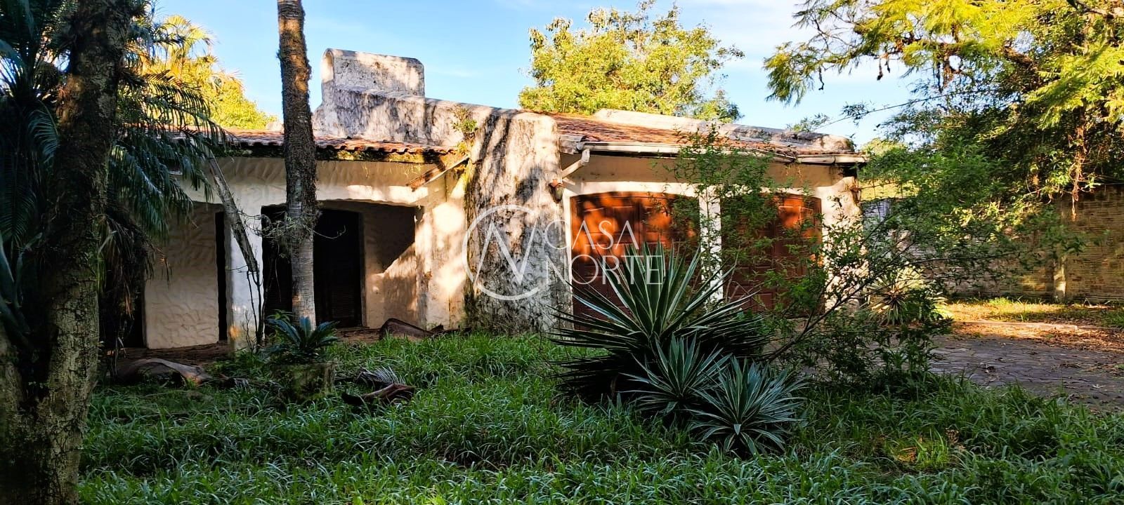 Casa à venda com 3 quartos, 300m², 1 suíte, 6 vagas, Rua Moyses Golubcik no bairro Chapéu do Sol em Porto Alegre