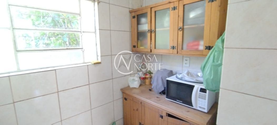 Casa de Condomínio à venda com 2 quartos, 45m², 1 vaga, Rua Mura no bairro Guarujá em Porto Alegre