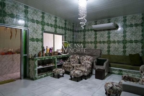 Casa à venda com 3 quartos, 300m², 3 suítes, 2 vagas, Rua João Francisco Barbosa no bairro Vila Nova em Porto Alegre