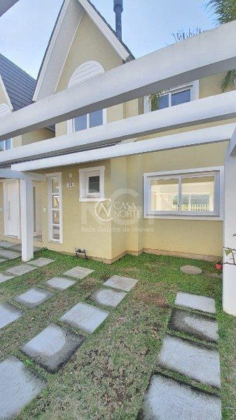 Casa de Condomínio à venda com 3 quartos, 128m², 1 suíte, 2 vagas, Rua Carlos Eduardo de Sa no bairro Aberta dos Morros em Porto Alegre