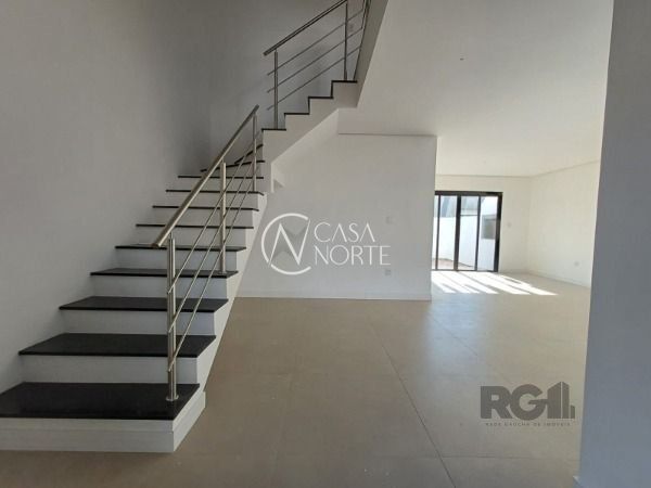 Casa de Condomínio à venda com 3 quartos, 153m², 3 suítes, 2 vagas, Rua Sinai no bairro Ipanema em Porto Alegre