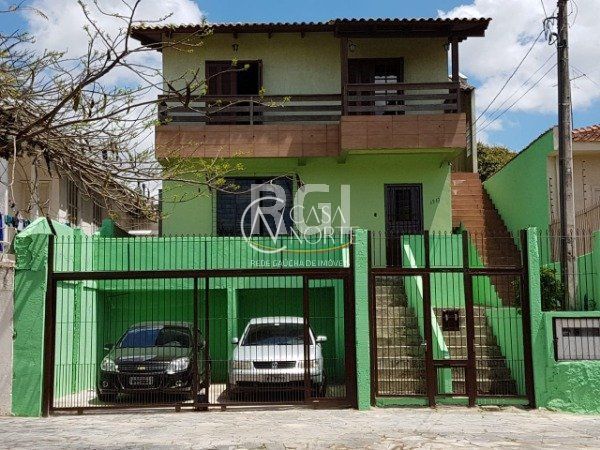 Casa à venda com 4 quartos, 450m², 1 suíte, 2 vagas, Avenida Benno Mentz no bairro Vila Ipiranga em Porto Alegre