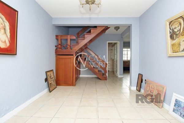 Casa de Condomínio à venda com 3 quartos, 161m², 1 suíte, 2 vagas, Rua Osorio Mendes Ouriques no bairro Guarujá em Porto Alegre