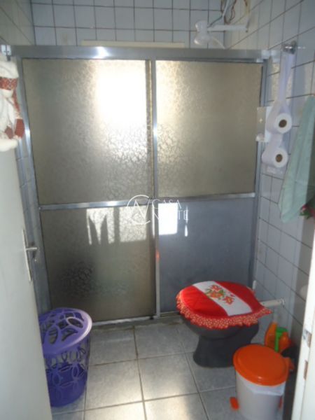 Casa à venda com 3 quartos, 156m², 2 vagas, Rua Professor Paulo Saurin no bairro Hípica em Porto Alegre