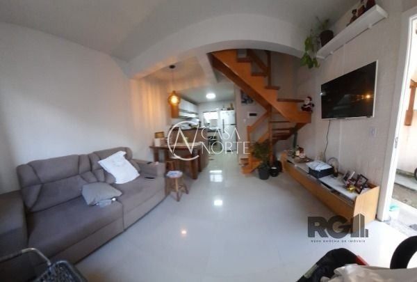 Casa à venda com 2 quartos, 55m², 2 vagas, Rua das Espatódeas no bairro Ponta Grossa em Porto Alegre