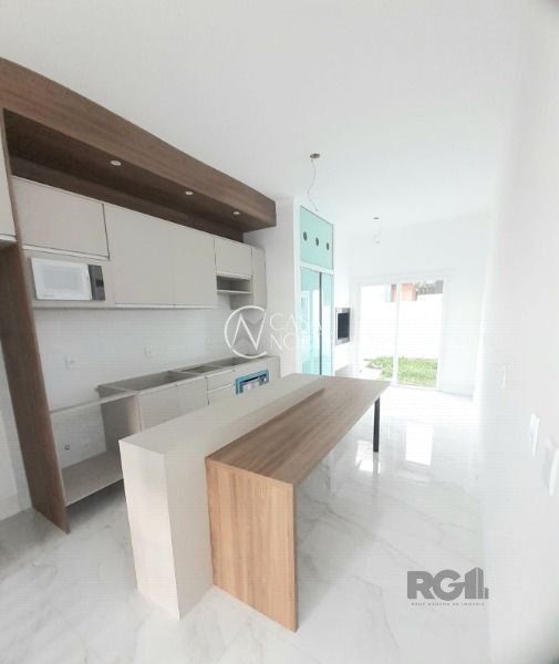 Casa de Condomínio à venda com 3 quartos, 104m², 1 suíte, 2 vagas, Rua Jorge Babot Miranda no bairro Aberta dos Morros em Porto Alegre