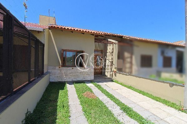 Casa à venda com 3 quartos, 103m², 1 suíte, 2 vagas, Rua Amoni no bairro Hípica em Porto Alegre