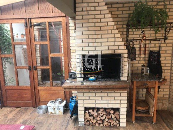 Casa de Condomínio à venda com 3 quartos, 189m², 1 suíte, 1 vaga, Rua Jacipuia no bairro Guarujá em Porto Alegre