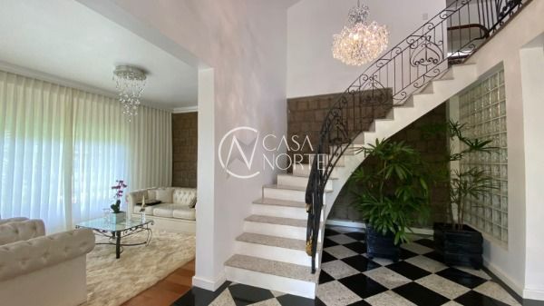 Casa de Condomínio à venda com 3 quartos, 348m², 3 suítes, 3 vagas, Avenida Professor Oscar Pereira no bairro Cascata em Porto Alegre