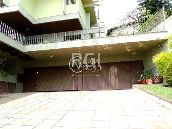Casa à venda com 4 quartos, 700m², 4 suítes, 6 vagas, Rua Coronel Gomes de Carvalho no bairro Sétimo Céu em Porto Alegre