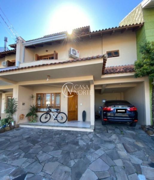 Casa de Condomínio à venda com 3 quartos, 201m², 1 suíte, 2 vagas, Avenida Juca Batista no bairro Cavalhada em Porto Alegre