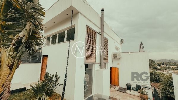 Casa à venda com 3 quartos, 300m², 1 suíte, 2 vagas, Rua Tenente-Coronel Mário Doernte no bairro Ipanema em Porto Alegre