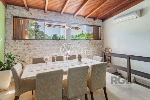 Casa de Condomínio à venda com 3 quartos, 175m², 1 suíte, 2 vagas, Avenida Wenceslau Escobar no bairro Vila Conceição em Porto Alegre