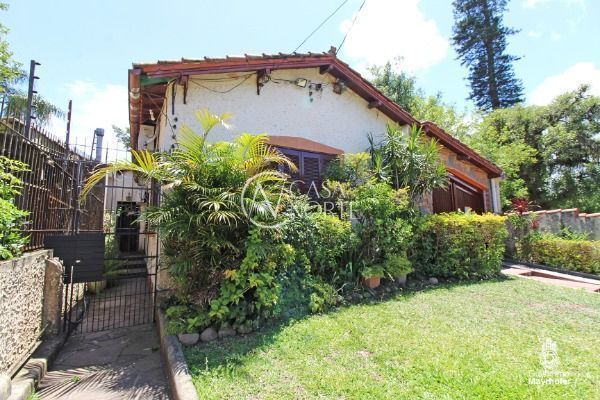 Casa à venda com 4 quartos, 180m², 3 vagas, Rua das Laranjeiras no bairro Ipanema em Porto Alegre