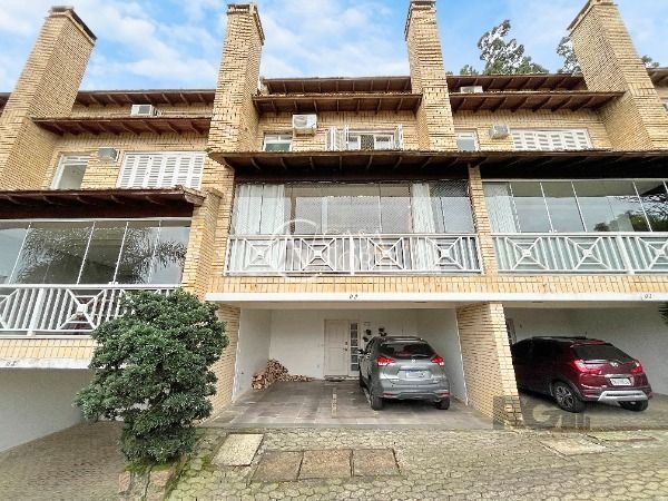 Casa de Condomínio à venda com 4 quartos, 219m², 1 suíte, 2 vagas, Rua Professor Xavier Simoes no bairro Sétimo Céu em Porto Alegre