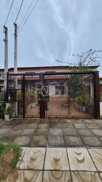 Casa à venda com 2 quartos, 100m², 1 suíte, 1 vaga, Rua Hilario Gonçalves Pinha no bairro Hípica em Porto Alegre