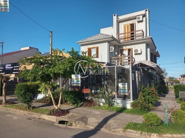 Casa à venda com 3 quartos, 181m², 3 suítes, 2 vagas, Rua Zuzu Angel no bairro Hípica em Porto Alegre
