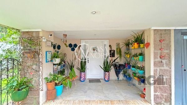 Casa de Condomínio à venda com 3 quartos, 322m², 1 suíte, 2 vagas, Rua Doutor Arnaldo da Silva Ferreira no bairro Jardim Isabel em Porto Alegre