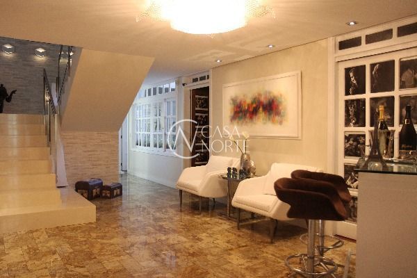 Casa à venda com 5 quartos, 740m², 5 suítes, 5 vagas, Rua Jigoro Kano no bairro Jardim Isabel em Porto Alegre