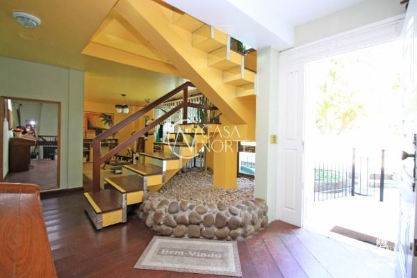 Casa à venda com 3 quartos, 200m², 1 suíte, 4 vagas, Rua Engenheiro Coelho Parreira no bairro Ipanema em Porto Alegre