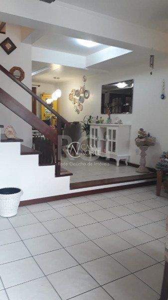 Casa à venda com 2 quartos, 110m², 2 suítes, 2 vagas, Rua Carlos Scliar no bairro Hípica em Porto Alegre