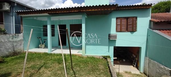 Casa à venda com 2 quartos, 60m², 2 vagas, Rua Tome Antônio de Souza no bairro Campo Novo em Porto Alegre