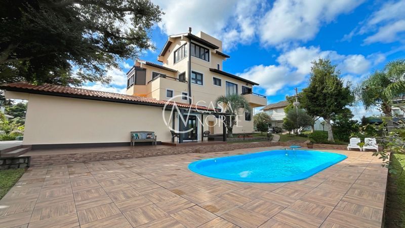 Casa de Condomínio à venda com 5 quartos, 455m², 2 suítes, 7 vagas, Rua Francisco Solano Borges no bairro Hípica em Porto Alegre