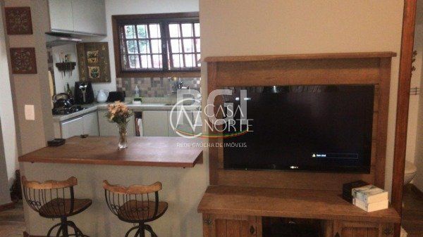 Casa de Condomínio à venda com 3 quartos, 189m², 1 suíte, 1 vaga, Rua Jacipuia no bairro Guarujá em Porto Alegre