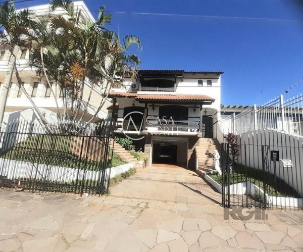Casa Comercial à venda com 4 quartos, 384m², 3 vagas, Rua Afonso Álvares no bairro Tristeza em Porto Alegre